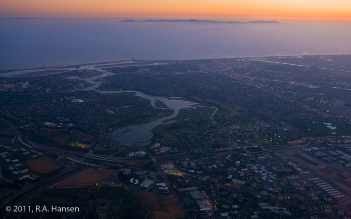 Includes Irvine and Newport Beach cityscape in foreground