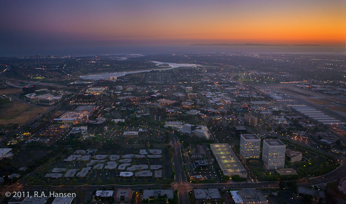 Includes Irvine and Newport Beach cityscape in foreground