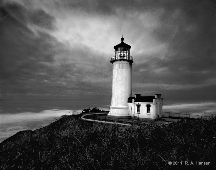 The Ilwaco or Long Beach Lighthouse is nestled in a state park on a 300 foot cliff above the confluence of the Columbia river...