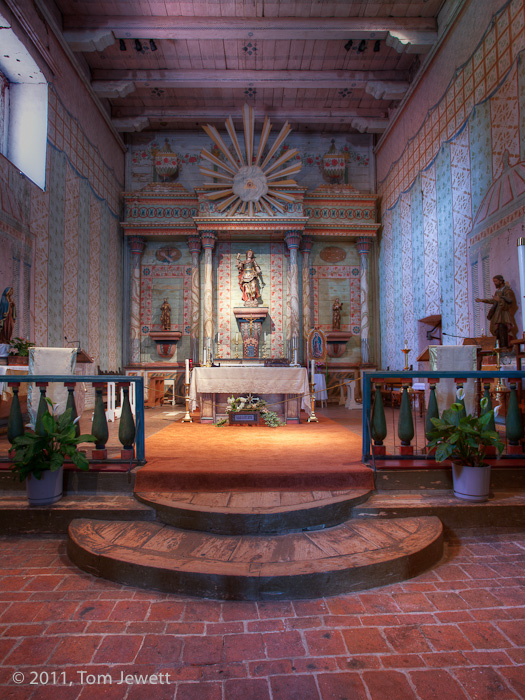 Interior of the church. Like many of the missions, this is constructed on a long rectangular plan, due to the limited width of...