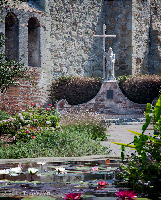 Fr. Serra blessing a convert -- Fray Junipero Serra founded this and eight more of the 21 California missions. A statue of him...