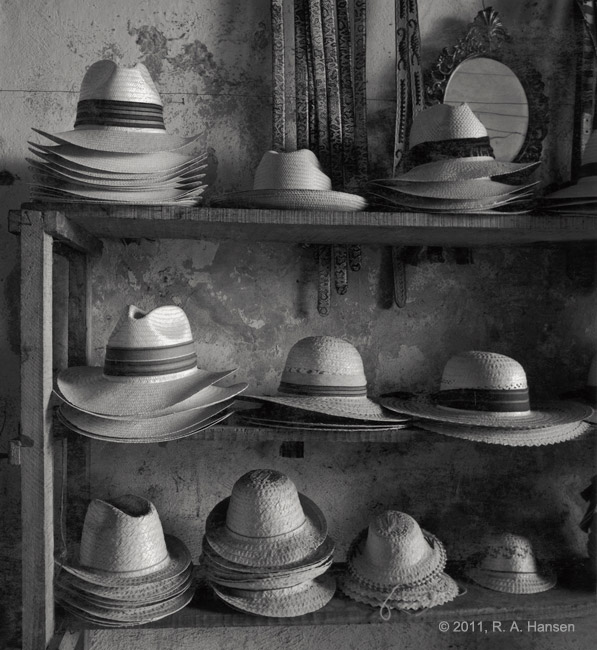 I came upon this display of handmade hats and belts in Merida, Yucatan one morning and made this photograph. Needless to say...